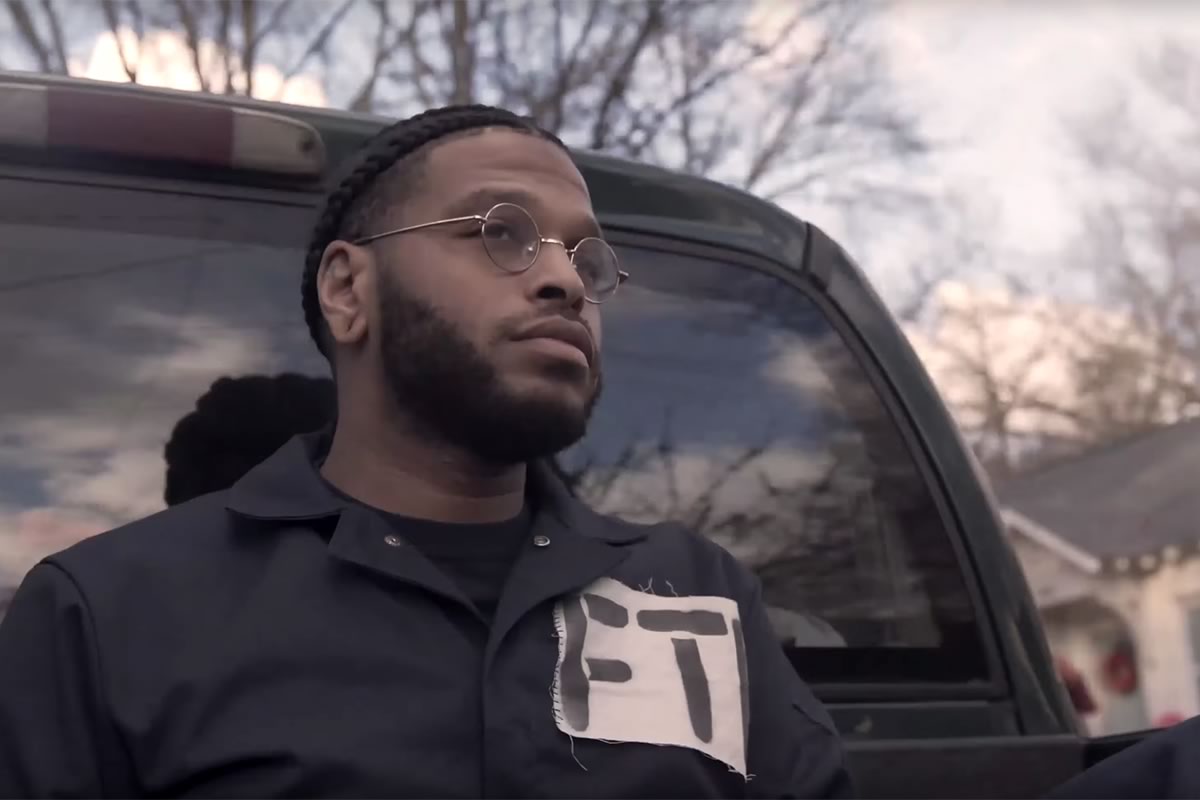 Atlanta rapper and producer HAVNTR sitting in the back of a pickup truck.