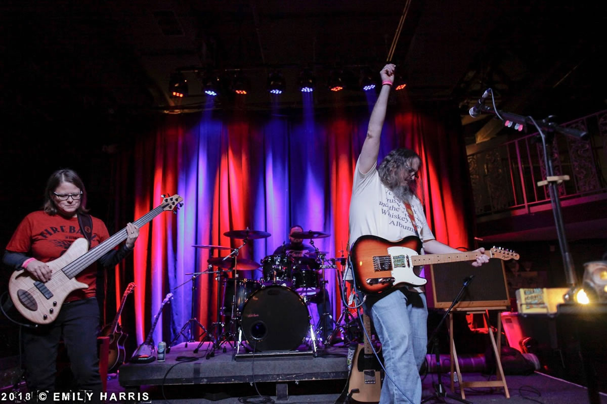 live photo of Atlanta trio Collins Drive.