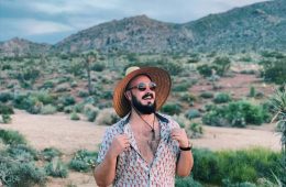 Andrew Lynn wearing a hat in the California desert.