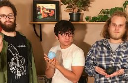 members of Dead Neighbors holding different balls