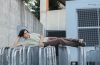 John Michael Young lounging on guard rails