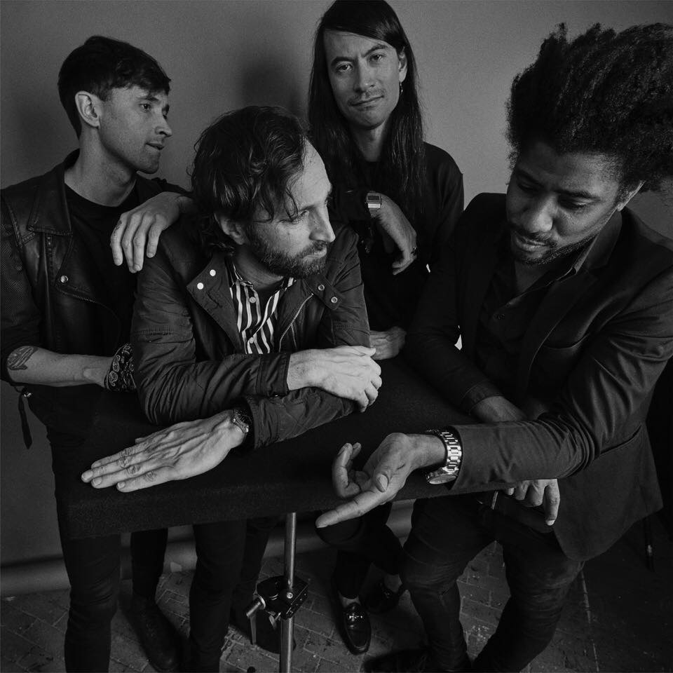 black and white photo of the band Algiers.