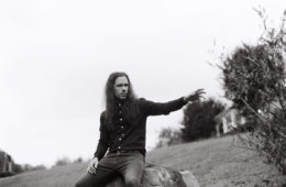 Nick Whitson of Phantom Electric sitting down and pointing