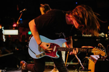 Tommy Trautwein of Well Kept rocking out on guitar