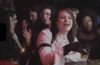 still shot of Sarah Rose holding a shot inSarah and the Safe Word's new video.