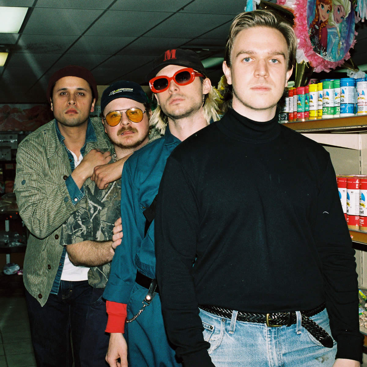 members of Pike Co. standing single file in a grocery aisle