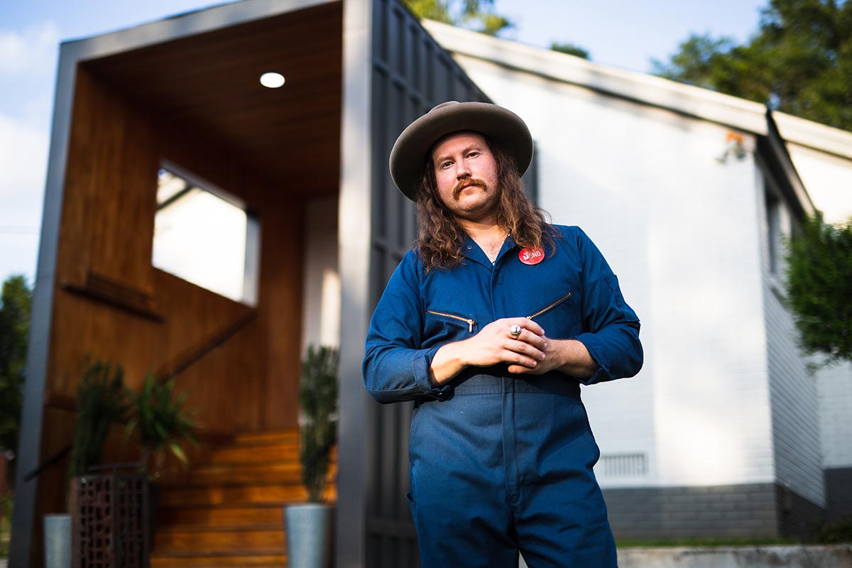 Damon Moon standing outside Standard Electric Recorders Co