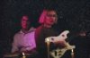 Steph Rinzler and Josh Hughes of Stevie Dinner playing with candles around them