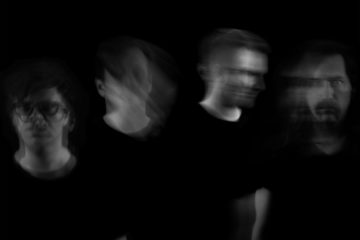 black and white photo of the band Vincas
