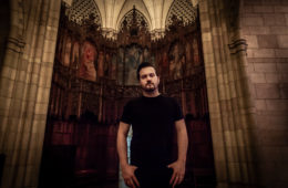 Ben Trickey standing in the entry of a cathedral