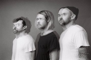 black and white photo of the band Mighty