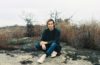 Austin Vos sitting in Arabia Mountain