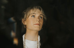 Annie Leeth wearing a white tee shirt