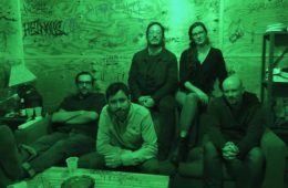 Members of Book Club sitting in a green room