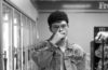 Cannon Rogers touching his nose in a grocery store aisle