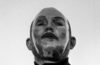 Ian Deaton wearing a silver mask