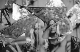 black and white press photo of mallbangs