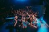 glimmers posing in front of a sold-out crowd in Purgatory at the Masquerade