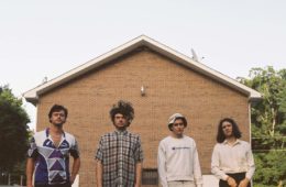 members of Wieuca standing outside a house