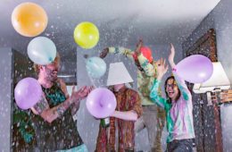 Members of BABY BABY partying in a hotel room