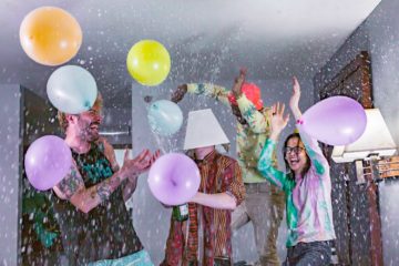Members of BABY BABY partying in a hotel room