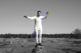 Alex Lotito standing on a rock on Arabia Mountain
