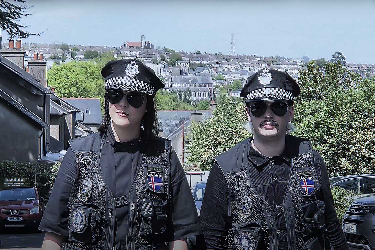 Seersha and Thorisson wear police uniforms in Cork, Ireland