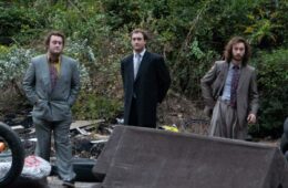 Members of the Pierres standing in the woods
