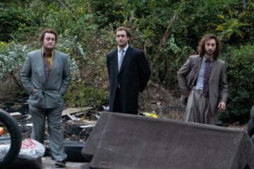 Members of the Pierres standing in the woods